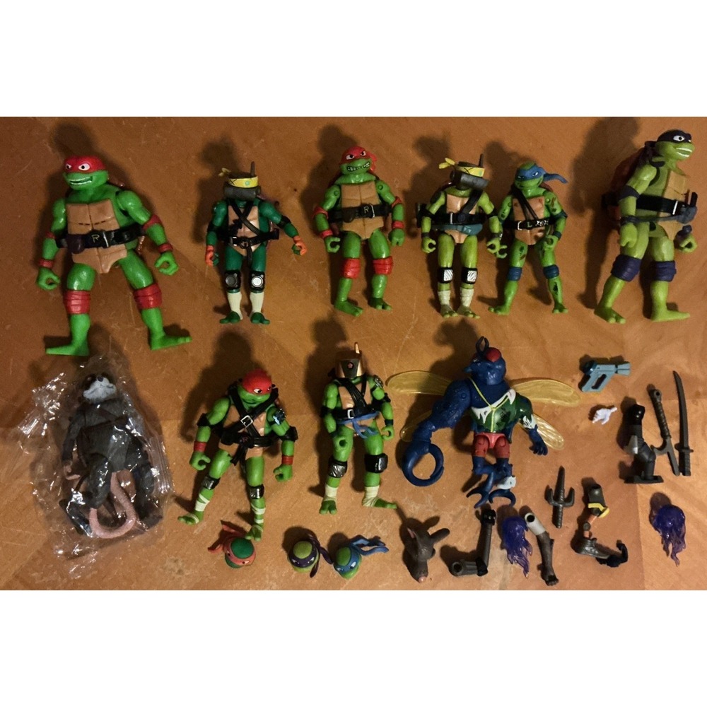 Random‎ Lot Of 10 Teenage Mutant Ninja Turtles (TMNT) Action Figure And Parts